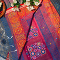 Colorful fabric with floral patterns on a textured surface
