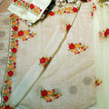Light green fabric with floral embroidery on a white background